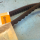 One of the old cracked belts vs new replacement